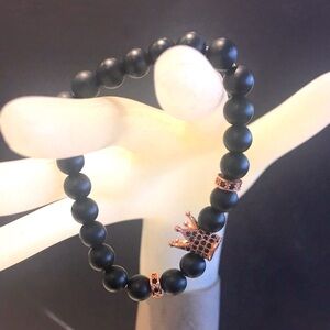Black tourmaline beaded bracelet with rose gold ornaments
